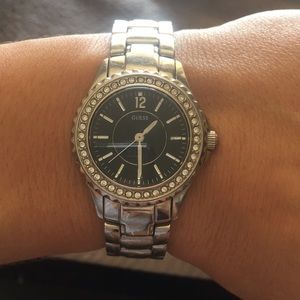 Silver banded, Black Face Guess Watch